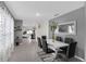 Modern dining room with neutral walls, tile flooring, and a stylish table set at 2838 Common Crane Ct, Harmony, FL 34773