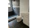 Modern bathroom featuring dark gray tile and a walk-in shower with stylish mosaic accents at 2900 S Semoran Blvd # 1, Orlando, FL 32822
