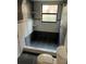 Modern bathroom featuring a tiled walk-in shower, toilet, and vanity at 2900 S Semoran Blvd # 1, Orlando, FL 32822