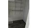 A reach-in closet with wire shelving and wood floors at 2900 S Semoran Blvd # 1, Orlando, FL 32822