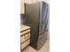 Modern stainless steel refrigerator, adding elegance to the kitchen at 2900 S Semoran Blvd # 1, Orlando, FL 32822