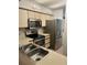 Well-lit kitchen with stainless steel appliances and sink at 2900 S Semoran Blvd # 1, Orlando, FL 32822