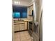 Spacious kitchen with modern stainless steel appliances and tile flooring at 2900 S Semoran Blvd # 1, Orlando, FL 32822