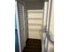 A pantry with shelving and dark wood floors at 2900 S Semoran Blvd # 1, Orlando, FL 32822