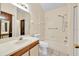 Bathroom featuring tile flooring, neutral walls, and a shower-tub combo at 2907 Prince Oak Ct, St Cloud, FL 34769