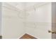 Walk-in closet featuring wire shelving and hardwood floor at 2907 Prince Oak Ct, St Cloud, FL 34769