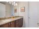 The bathroom features a double vanity with granite countertops at 331 Pendant Ct, Kissimmee, FL 34747