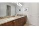 Bathroom featuring a double vanity with granite countertops at 331 Pendant Ct, Kissimmee, FL 34747