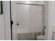 Bathroom featuring a shower/tub combination with a white shower curtain at 466 Cool Summer Ln, Davenport, FL 33837