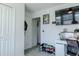 Bright bedroom with a walk-in closet, desk and mounted flat screen TV at 466 Cool Summer Ln, Davenport, FL 33837