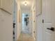 Bright hallway with neutral walls and carpet floors at 466 Cool Summer Ln, Davenport, FL 33837