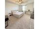 Spacious bedroom with tray ceiling, carpeted floor, and neutral décor at 4736 Tribute Trl, Kissimmee, FL 34746