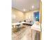 Bright home office with modern desk, stylish decor, and comfortable seating area at 4736 Tribute Trl, Kissimmee, FL 34746