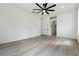 Spacious bedroom featuring neutral color palette, hardwood floors, and recessed lighting at 5254 Mill Stream Dr, St Cloud, FL 34771