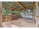 Open-air gazebo featuring a chimney stove, bar seating, and views of the expansive backyard at 5254 Mill Stream Dr, St Cloud, FL 34771