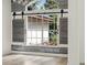 Bright living space featuring luxury vinyl plank floors and custom window treatments at 5254 Mill Stream Dr, St Cloud, FL 34771