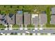 Aerial view of the property showcasing the backyard, pool, and surrounding neighborhood at 5648 Cedar Chase Dr, St Cloud, FL 34771