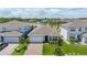 Stunning aerial view of a home near a serene lake in a picturesque neighborhood at 5648 Cedar Chase Dr, St Cloud, FL 34771