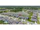 Aerial view of a community by a lake. The home marked with a red pin is near the lake and community pool at 5648 Cedar Chase Dr, St Cloud, FL 34771