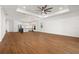 Expansive living space boasts tile floors, tray ceiling, modern light fixtures and an open floor plan at 5648 Cedar Chase Dr, St Cloud, FL 34771
