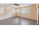 Bright bedroom with shuttered windows, tile floors and neutral paint at 612 Lakeshore Blvd, Kissimmee, FL 34744