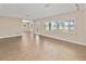 Spacious living room with neutral tile floors, and great natural light throughout the space at 612 Lakeshore Blvd, Kissimmee, FL 34744