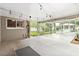 Spacious screened patio with string lights, providing an inviting outdoor living space at 612 Lakeshore Blvd, Kissimmee, FL 34744