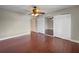 Bedroom featuring hardwood floors and ample closet space at 626 Orange Dr # 243, Altamonte Springs, FL 32701