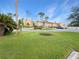 Well-maintained condos with green lawns, landscaping, and ample parking for residents and visitors at 626 Orange Dr # 243, Altamonte Springs, FL 32701