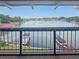 Picturesque view of lake with boats, captured from screened balcony at 626 Orange Dr # 243, Altamonte Springs, FL 32701