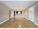 Combination living room featuring tiled flooring and view into kitchen at 626 Orange Dr # 243, Altamonte Springs, FL 32701