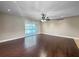 Spacious living room with hardwood floors and a view of the lake at 626 Orange Dr # 243, Altamonte Springs, FL 32701