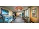 Elegant lobby with comfortable seating, stylish decor, and a welcoming reception area with a chandelier at 7541 Marker Ave, Kissimmee, FL 34747