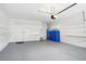 Well-organized garage with door to outside and ample storage space at 759 Largo Pass, Poinciana, FL 34759