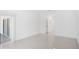 Living room features bright white interior and glass sliding doors to lanai at 759 Largo Pass, Poinciana, FL 34759