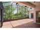 Spacious screened patio with beautiful backyard views and access to nature at 759 Largo Pass, Poinciana, FL 34759