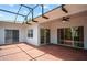 Covered patio features brick flooring and direct access to the house at 759 Largo Pass, Poinciana, FL 34759