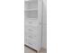 Walk-in closet with built-in shelving and drawers at 759 Largo Pass, Poinciana, FL 34759