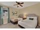 Bedroom featuring two beds, carpet and neutral walls at 7613 Brookhurst Ln, Kissimmee, FL 34747