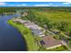 Gorgeous waterfront property with lush landscaping and peaceful lake views at 777 Glendora Road, Poinciana, FL 34759