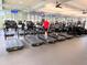 State-of-the-art fitness center with treadmills and exercise equipment overlooking outdoor scenery at 777 Glendora Road, Poinciana, FL 34759