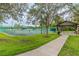 A well-maintained tennis court and picnic area, creating a recreational and social space for residents at 777 Glendora Road, Poinciana, FL 34759