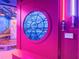 A Star Wars themed bedroom with a large porthole window and light sabers at 7802 Palmilla Ct, Reunion, FL 34747
