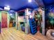 Fun Star Wars themed bedroom with unique bunk bed and character murals at 7802 Palmilla Ct, Reunion, FL 34747