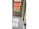 Neutral colored room with tile floor and a large window at 808 Massy Ct, Kissimmee, FL 34759