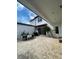 Backyard patio with brick floors, outdoor seating and grill at 8919 Lakeshore Pointe Dr, Winter Garden, FL 34787