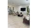 Open-concept living space flows seamlessly into the kitchen, perfect for modern living and entertaining at 8919 Lakeshore Pointe Dr, Winter Garden, FL 34787