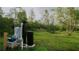 Beautiful backyard with lush greenery and well-maintained equipment, perfect for outdoor relaxation at 9345 Atlanta Dr, St Cloud, FL 34773