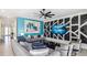 Bright living room features stylish decor, comfortable seating, and an entertainment center at 1005 Coyote Creek Way, Reunion, FL 34747