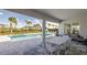 This large patio offers plenty of seating and fantastic views of the pool and landscaping at 1005 Coyote Creek Way, Reunion, FL 34747